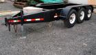 Used- Quality Welding Service 21,000 lb triple axle generator trailer with no fuel tank. New in 1999.