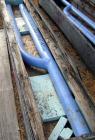 Used Glass Lined H Baffle for approximate 3000 gallon reactor. 4 1/2'' diameter shaft x 117'' long x 16'' wide. Includes metal tip.