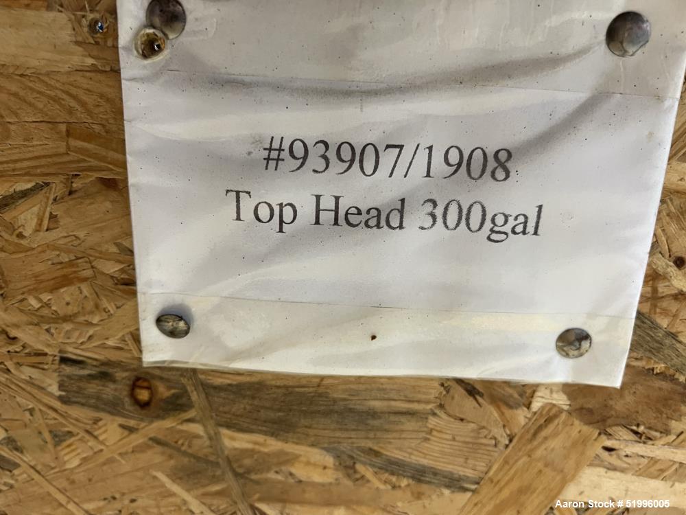 Used Reglassed Pfaudler Glass Head for a 300 gallon vessel. Approximately 48"diameter. Openings: 8", 18" x 12" manhole, No cover, 4-1/2", (3) 4".