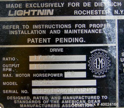 Used Dedietrich/Lightnin Agitator, Model 63Q12, Flowserve seal, ratio 17 to 1, output 100 rpm. Driven by a 3.3/20 hp, 3/10-60/84-460 volt, 260-1760 rpm XP motor. Approximate 26'' O.D. mounting flange.