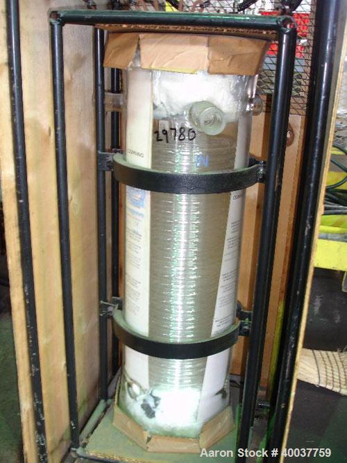 Unused- QVC Coil Condenser, Model HE9, 25 square feet. Glass construction, coil tube rated 40 psi at 300 degrees F, shell rated 11 psi at 300 degrees F, approximately 225 mm shell diameter, 5.3 gallo...