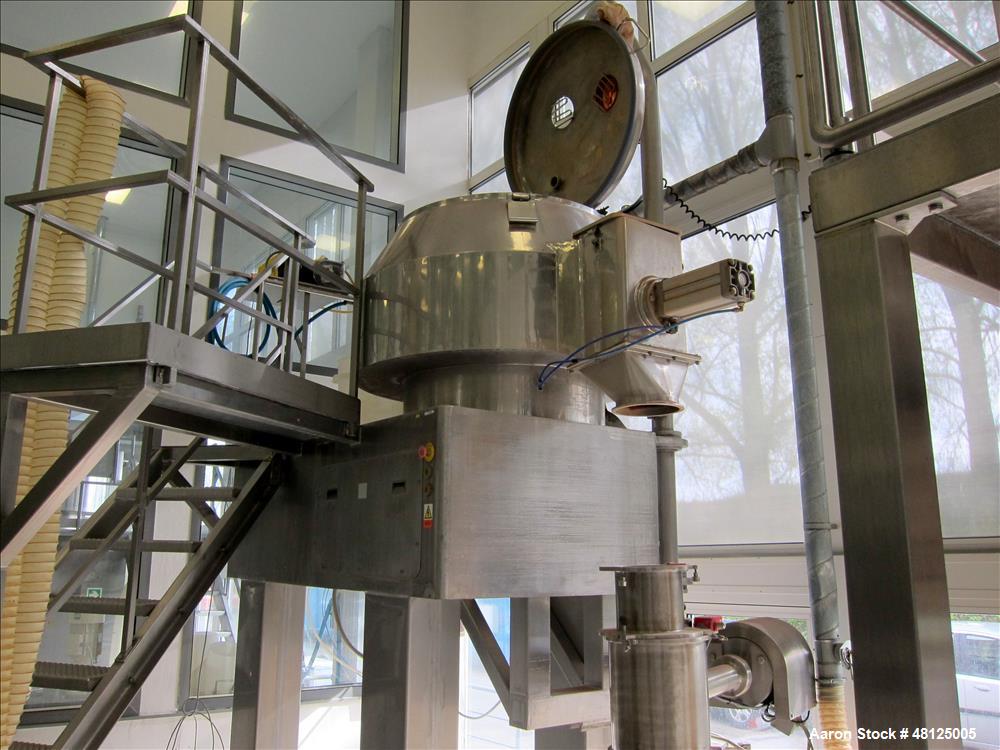 Used TK Fielder high shear mixer, Polished stainless steel construction, Total capacity 14 cu ft (400 liter), working capacity 10.59 cu ft (300 liter). 39" (1190 mm) dia, x 193" (595 mm) st. side non...