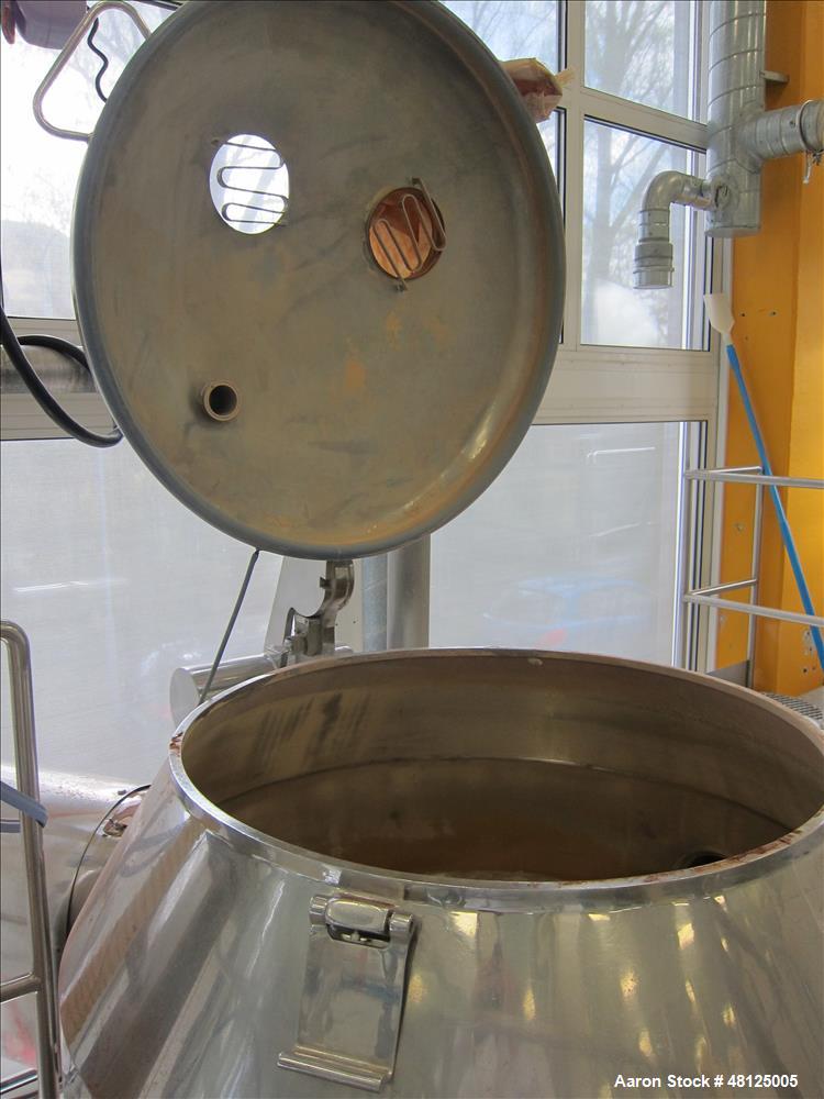 Used TK Fielder high shear mixer, Polished stainless steel construction, Total capacity 14 cu ft (400 liter), working capacity 10.59 cu ft (300 liter). 39" (1190 mm) dia, x 193" (595 mm) st. side non...