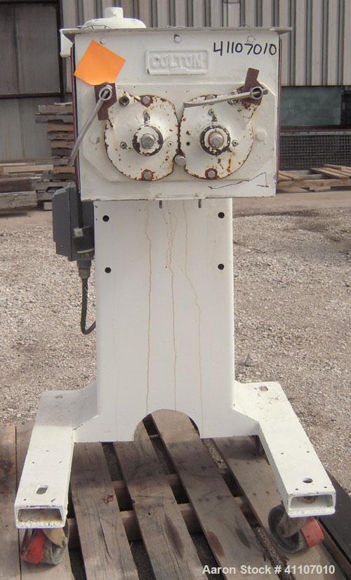 Used Colton Twin Rotary Oscillating Granulator, model 544A, 304 stainless steel. (2) 4" diameter 6 blade rotors. Top feed, no cover, bottom discharge chute with screen. Driven by a 1 hp, 3/60/208-220...