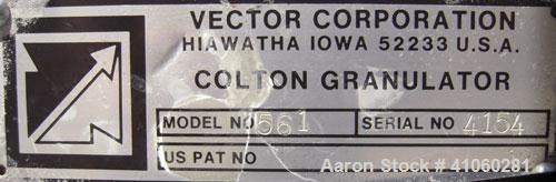 Used Vector Colton Wet Granulator, model 561, 304 stainless steel. Approximate 12" diameter x 3" deep screen. Top feed with hopper. Driven by a 3 hp, 3/60/230/460 volt, 1760 rpm motor. Mounted on an ...