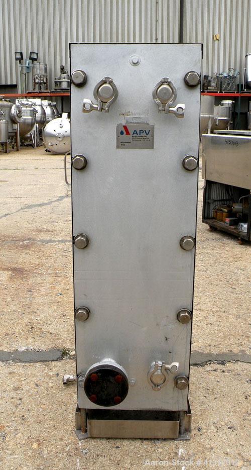 Used APV Crepaco Plate Heat Exchanger, Model H17S, 316 Stainless Steel. Approximately 230 square feet. (144) approximate 10" wide x 36" long plates, no rating. (3) tri-clamp, (1) flanged inlet/outlet...