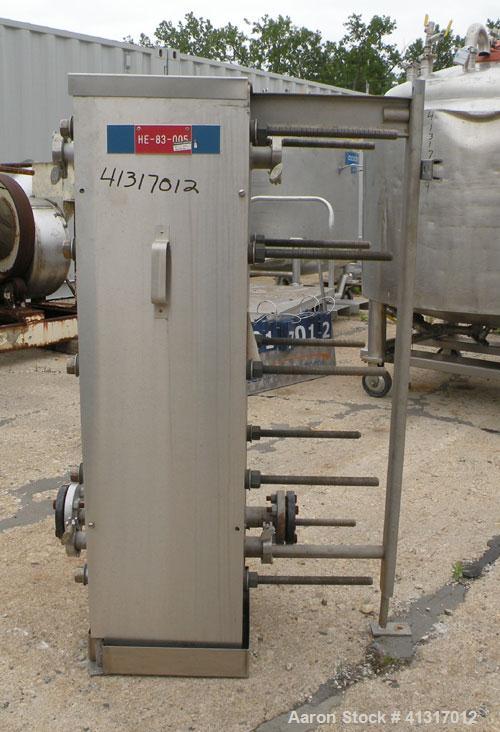 Used APV Crepaco Plate Heat Exchanger, Model H17S, 316 Stainless Steel. Approximately 230 square feet. (144) approximate 10" wide x 36" long plates, no rating. (3) tri-clamp, (1) flanged inlet/outlet...