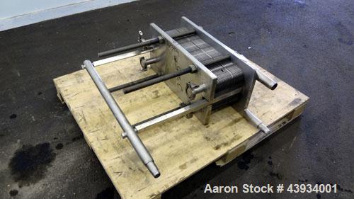 Used APV Crepaco Paraflow Plate Heat Exchanger, Model SR15-S, #2 Frame Size. Approximately 61 square feet. (55) 8-1/4” wide x 22-7/16” long 316 stainless steel plates. Maximum operating pressure 150 ...