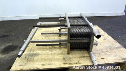 Used APV Crepaco Paraflow Plate Heat Exchanger, Model SR15-S, #2 Frame Size. Approximately 61 square feet. (55) 8-1/4” wide x 22-7/16” long 316 stainless steel plates. Maximum operating pressure 150 ...