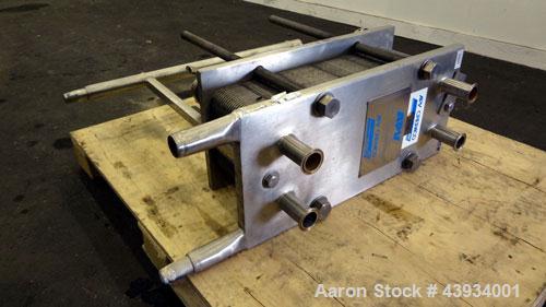Used APV Crepaco Paraflow Plate Heat Exchanger, Model SR15-S, #2 Frame Size. Approximately 61 square feet. (55) 8-1/4” wide x 22-7/16” long 316 stainless steel plates. Maximum operating pressure 150 ...