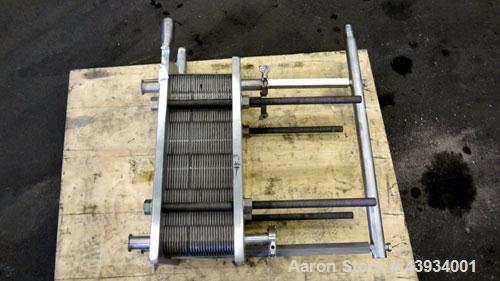 Used APV Crepaco Paraflow Plate Heat Exchanger, Model SR15-S, #2 Frame Size. Approximately 61 square feet. (55) 8-1/4” wide x 22-7/16” long 316 stainless steel plates. Maximum operating pressure 150 ...