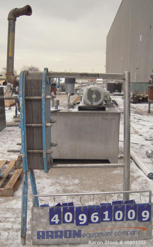 Used- APV Plate Heat Exchanger, Type HXL(6), 317 stainless steel. Approximately 61 square feet. (31) approximate 8" wide x 3...