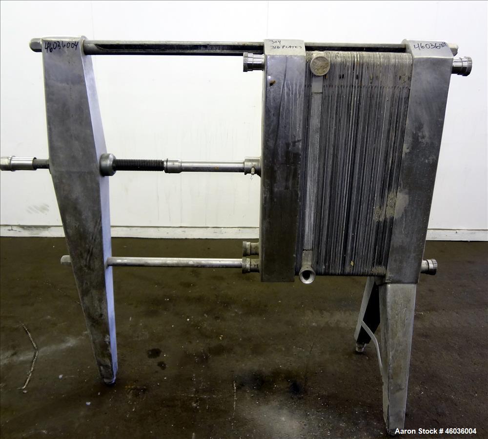 Used APV Paraflow Plate Heat Exchangers, Type HX, Approximte 130 square feet. (66) 32" Long x 9" wide 316 stainless steel plates. (8) 2" Diameter inlets/outlets, (1) divider. Serial# M/C 3551. No pre...