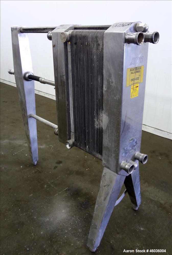 Used APV Paraflow Plate Heat Exchangers, Type HX, Approximte 130 square feet. (66) 32" Long x 9" wide 316 stainless steel plates. (8) 2" Diameter inlets/outlets, (1) divider. Serial# M/C 3551. No pre...