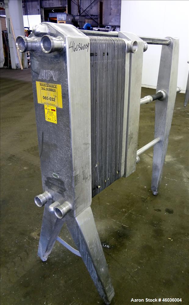 Used APV Paraflow Plate Heat Exchangers, Type HX, Approximte 130 square feet. (66) 32" Long x 9" wide 316 stainless steel plates. (8) 2" Diameter inlets/outlets, (1) divider. Serial# M/C 3551. No pre...
