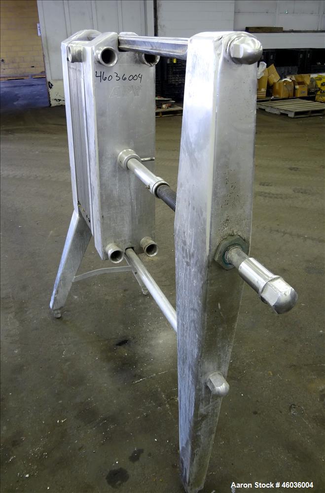Used APV Paraflow Plate Heat Exchangers, Type HX, Approximte 130 square feet. (66) 32" Long x 9" wide 316 stainless steel plates. (8) 2" Diameter inlets/outlets, (1) divider. Serial# M/C 3551. No pre...