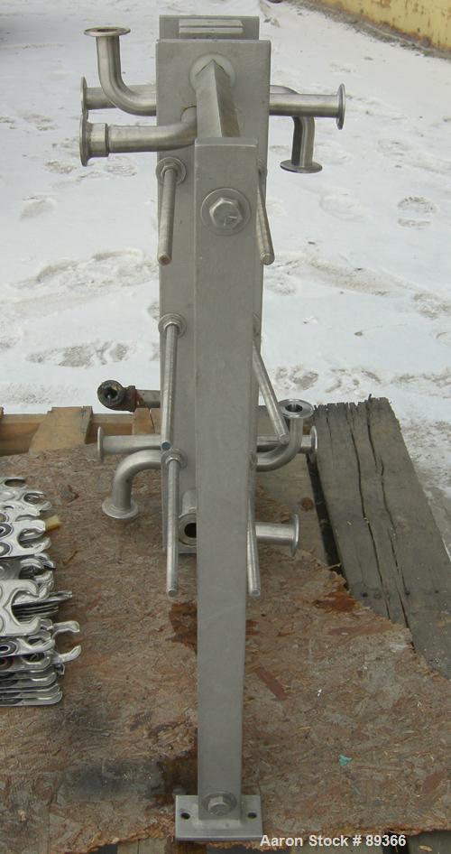 USED: APV plate heat exchanger, model Junior, 316 stainless steel. Approximate 25 square feet. 93 approximate 2-3/4" wide x 22-1/2" long plates. Expandable stainless steel frame.