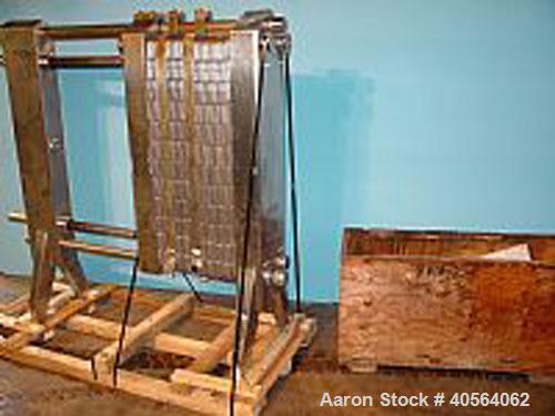 Used APV R51 Royal Paraflow Stainless Steel Plate Heat Exchanger. Approximate 400 square feet. Mounted on unit (59) stainless steel 16 in wide x 60 in high plates, (26) spare plates, (2) 2 1/2 in wid...