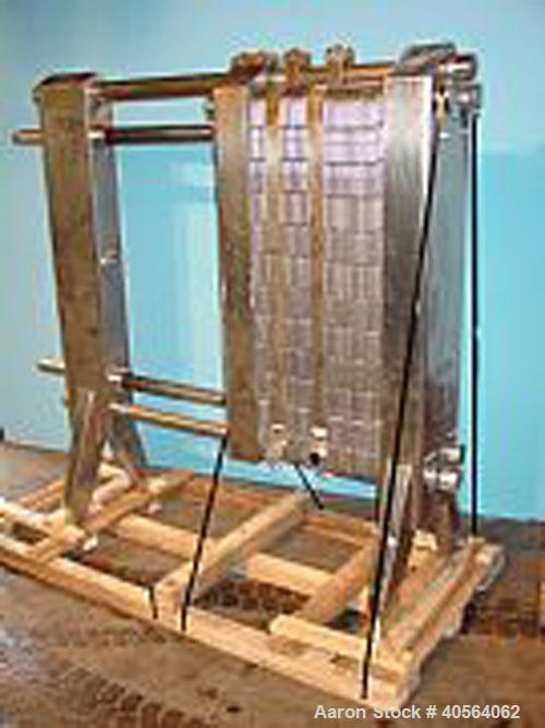 Used APV R51 Royal Paraflow Stainless Steel Plate Heat Exchanger. Approximate 400 square feet. Mounted on unit (59) stainless steel 16 in wide x 60 in high plates, (26) spare plates, (2) 2 1/2 in wid...