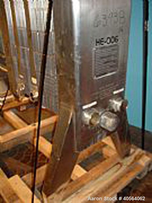 Used APV R51 Royal Paraflow Stainless Steel Plate Heat Exchanger. Approximate 400 square feet. Mounted on unit (59) stainless steel 16 in wide x 60 in high plates, (26) spare plates, (2) 2 1/2 in wid...