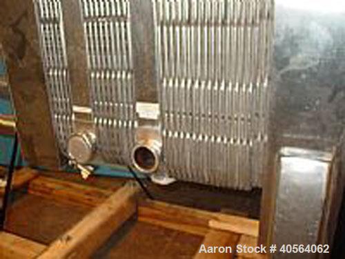 Used APV R51 Royal Paraflow Stainless Steel Plate Heat Exchanger. Approximate 400 square feet. Mounted on unit (59) stainless steel 16 in wide x 60 in high plates, (26) spare plates, (2) 2 1/2 in wid...
