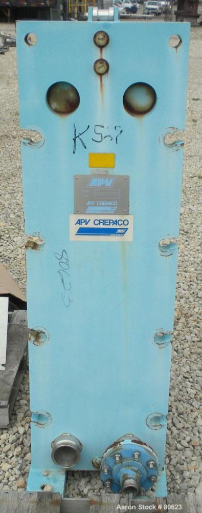 Used APV Plate Heat Exchanger, Approximately 878 Square Feet, Model R57, 316 Stainless Steel. (61) 16" wide x 60" tall plates, (2) 4-1/2" fittings, (2) 4" sanitary fittings. Mounted in a carbon steel...