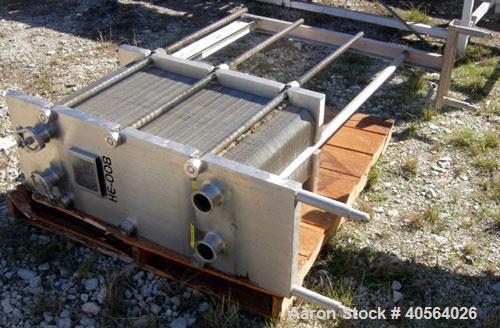Used APV Plate Heat Exchanger, Model SR20,  stainless steel. Approximately 258 square feet. (155) approximate 12" wide x 32" long plates, rated 100 psi.  2 1/2" tri-clamp inlet/outlet. Expandable sta...