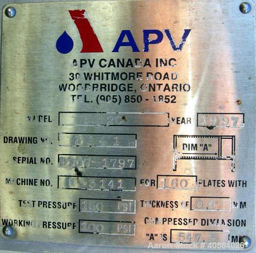 Used APV Plate Heat Exchanger, Model SR20,  stainless steel. Approximately 258 square feet. (155) approximate 12" wide x 32" long plates, rated 100 psi.  2 1/2" tri-clamp inlet/outlet. Expandable sta...