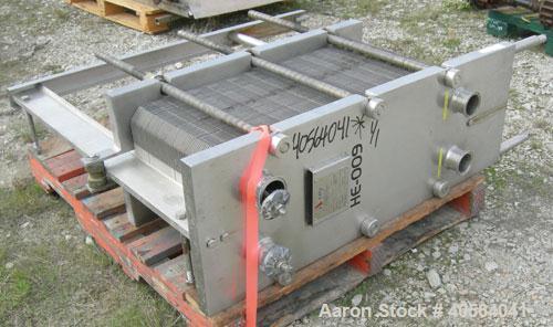Used APV Plate Heat Exchanger, Model SR20, 304 stainless steel. Approximately 215 square feet. (129) approximate 12" wide x 32" long plates, rated 100 psi.  2 1/2" tri-clamp inlet/outlet. Expandable ...