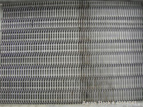 Used APV Plate Heat Exchanger, Model SR20, 304 stainless steel. Approximately 215 square feet. (129) approximate 12" wide x 32" long plates, rated 100 psi.  2 1/2" tri-clamp inlet/outlet. Expandable ...