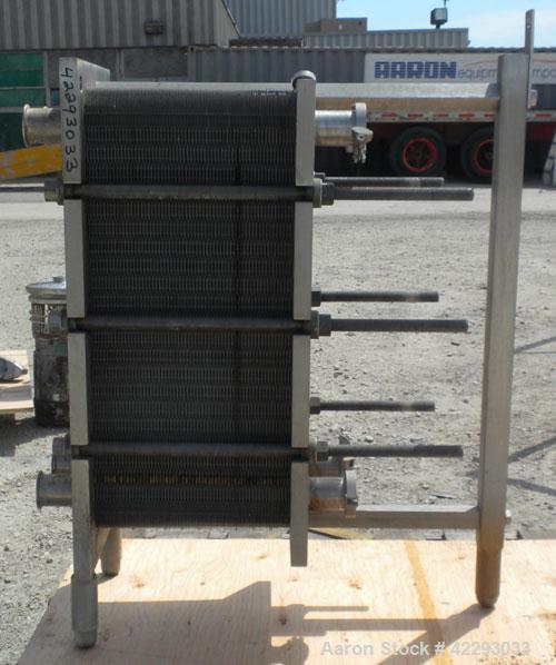 Used APV Plate Heat Exchanger, 183.2 square feet, model SR25S. (121) 32" long x 32" wide, 316 stainless steel plates. Designed for 150 PSI. 2-1/2" Sanitary inlet/outlet. Mounted on an expandable fram...