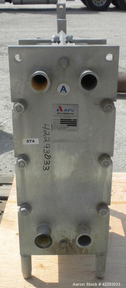 Used APV Plate Heat Exchanger, 183.2 square feet, model SR25S. (121) 32" long x 32" wide, 316 stainless steel plates. Designed for 150 PSI. 2-1/2" Sanitary inlet/outlet. Mounted on an expandable fram...