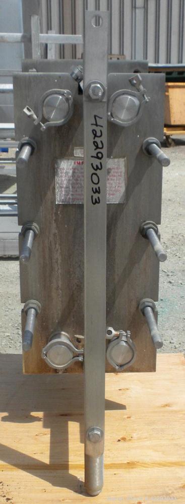Used APV Plate Heat Exchanger, 183.2 square feet, model SR25S. (121) 32" long x 32" wide, 316 stainless steel plates. Designed for 150 PSI. 2-1/2" Sanitary inlet/outlet. Mounted on an expandable fram...