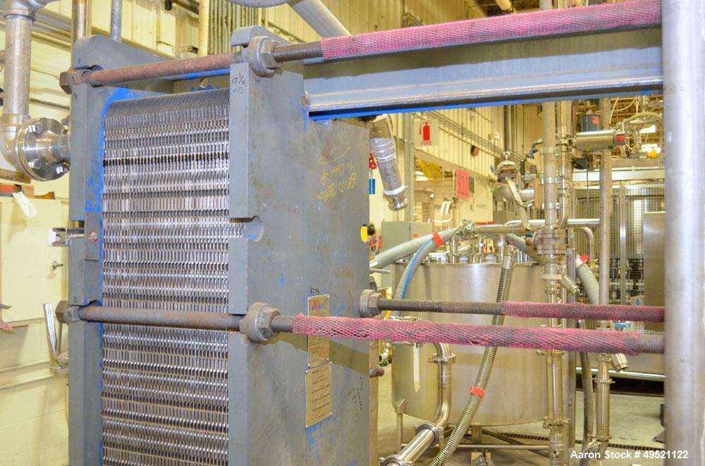 Used APV Plate Heat Exchanger, Model SR6GL, Serial# 30963.1. National Board # 242. Approximately (41) 772/757 mm plates. Rated 150 PSI @ 275 F and -20 F @ 150 PSI. Stainless Steel Construction. Built...