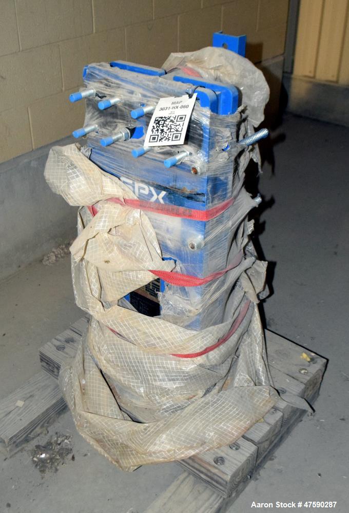 Unused- APV Paraflow Gasketed Plate Heat Exchanger, 31.9 Square Feet, Model V017 M-10. (19) Titanium plates. Rated 150 psi at -20 to 300 degrees F. National Board# 13058, serial# G2011001067, built 2...
