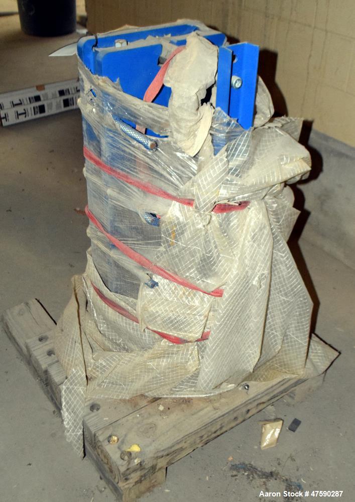 Unused- APV Paraflow Gasketed Plate Heat Exchanger, 31.9 Square Feet, Model V017 M-10. (19) Titanium plates. Rated 150 psi at -20 to 300 degrees F. National Board# 13058, serial# G2011001067, built 2...