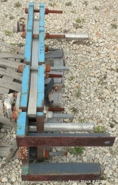 Used Mueller Accu-Therm Plate Heat Exchanger, Approximately 28 Square Feet, Model AT20 C-20, 316 Stainless Steel. (12) plates approximately 14" wide x 37" tall. Rated 100 PSI at 150 Degrees F. 3" inl...