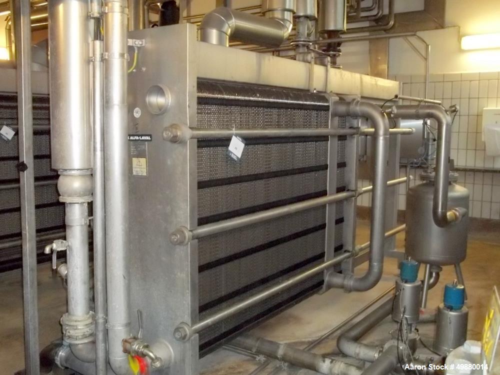 Used Alfa Laval plate heat exchanger, type M15-F-FMC, stainless steel, Max. working pressure 195 PSI/13 bar at a max. 248 deg F/120 deg C. Serial # 30100-545, New 1992. Incl. 1 x Dessel stainless ste...