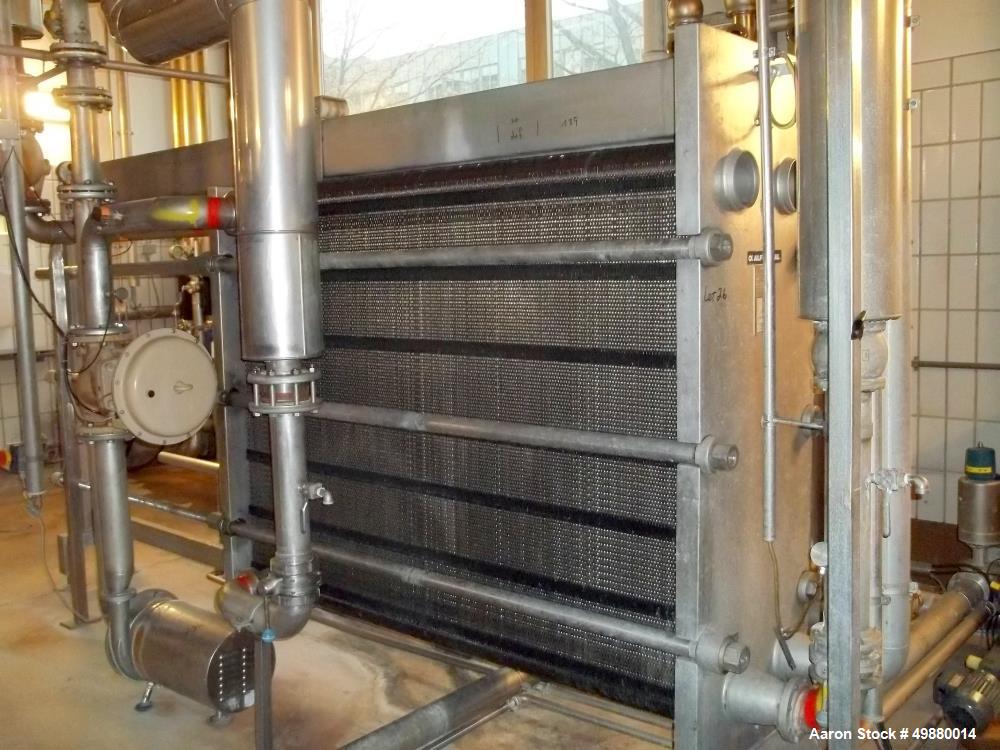 Used Alfa Laval plate heat exchanger, type M15-F-FMC, stainless steel, Max. working pressure 195 PSI/13 bar at a max. 248 deg F/120 deg C. Serial # 30100-545, New 1992. Incl. 1 x Dessel stainless ste...