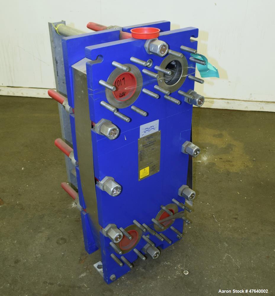 Unused- Alfa Laval Plate Exchanger, 87.83 Square Feet, Model M10-BDFG. (36) 120 mm thick 316 stainless steel plates. Designed 150 psi at -20 to 212 degrees F. (4) 3" Inlets & outlets. Mounted on a ca...