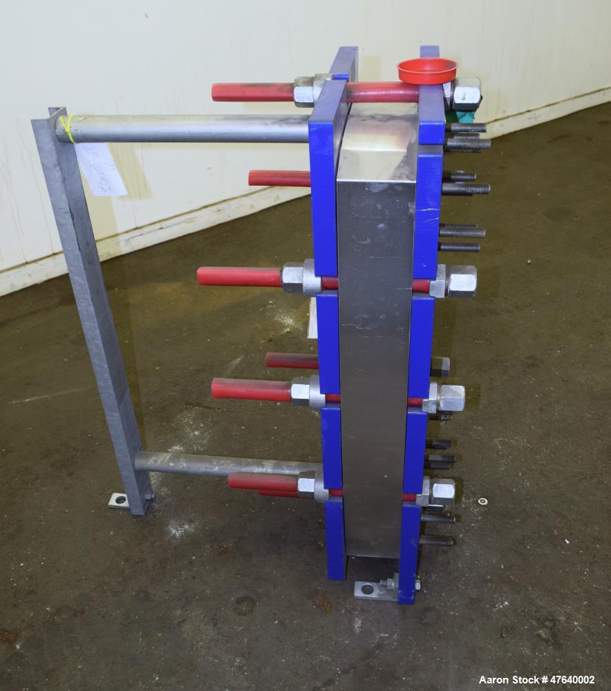 Unused- Alfa Laval Plate Exchanger, 87.83 Square Feet, Model M10-BDFG. (36) 120 mm thick 316 stainless steel plates. Designed 150 psi at -20 to 212 degrees F. (4) 3" Inlets & outlets. Mounted on a ca...