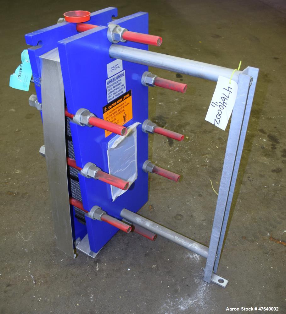 Unused- Alfa Laval Plate Exchanger, 87.83 Square Feet, Model M10-BDFG. (36) 120 mm thick 316 stainless steel plates. Designed 150 psi at -20 to 212 degrees F. (4) 3" Inlets & outlets. Mounted on a ca...