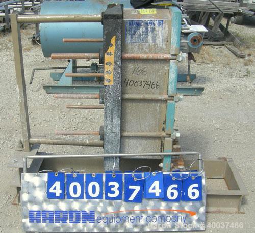 Used Alfa Laval Plate Heat Exchanger, Model M10-BFG, 255 square feet, 304 stainless steel. (99) plates. Rated 150 psi at 230 deg.f.. Built 1993.