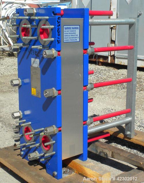 Unused- Alfa Laval Thermal Plate Exchanger, 149.80 Square Feet, Model M10-BFG. (60) 0.5 mm thick 316 stainless steel plates. Designed 150 psi at –20 to 86 deg F. (4) 4'' Blind inlets/outlets. Mounted...