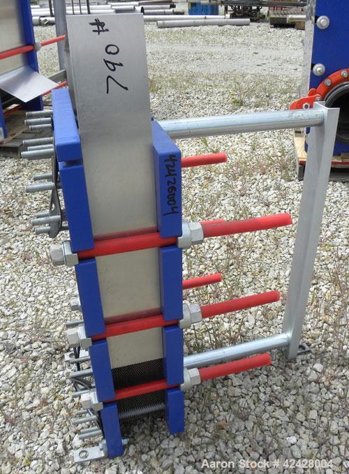 Used Alfa Laval Thermal Plate Exchanger, 116.3 Square Feet, Model M10-BFG. (47) Approximately 14-1/2 wide x 34-1/2 tall x 0.50 mm thick commercially pure titanium plates. Designed 150 psi at 20 to 22...