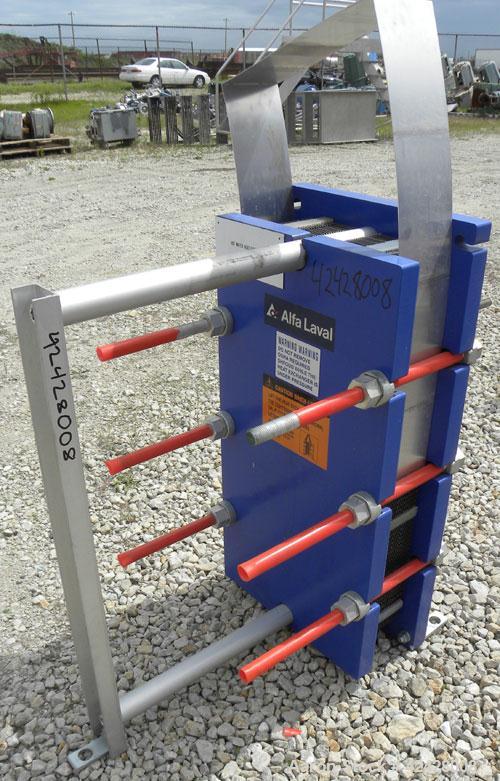 Used Alfa Laval Thermal Plate Exchanger, 116.2 Square Feet, Model M10-BFG. (47) Approximately 14-1/2 wide x 34-1/2 tall x 0.50 mm thick commercially pure titanium plates. Designed 150 psi at 20 to 22...
