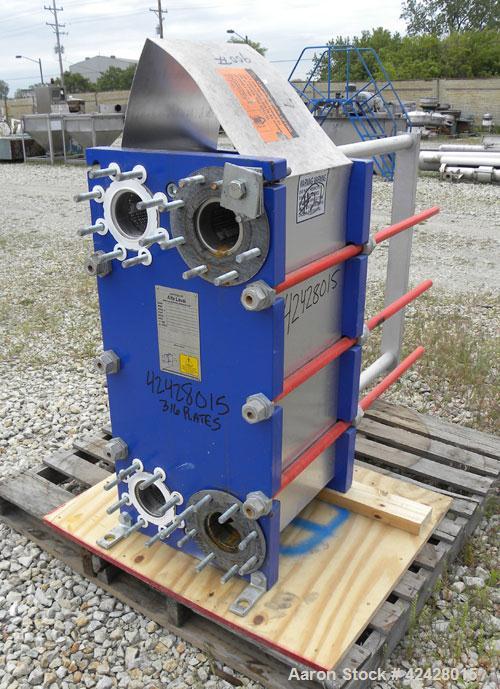 Used Alfa Laval Thermal Plate Exchanger, 296.98 square feet, model M10-BFG. (117) Approximately 14-1/2’’ wide x 34-1/2’’ tall x 0.50 mm thick 316 stainless steel plates. Designed 150 psi at –20 to 22...