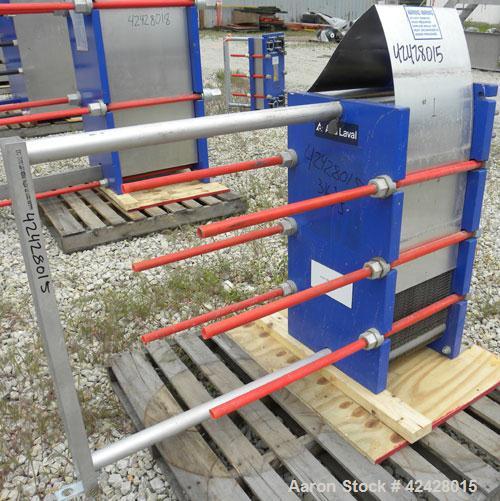 Used Alfa Laval Thermal Plate Exchanger, 296.98 square feet, model M10-BFG. (117) Approximately 14-1/2’’ wide x 34-1/2’’ tall x 0.50 mm thick 316 stainless steel plates. Designed 150 psi at –20 to 22...