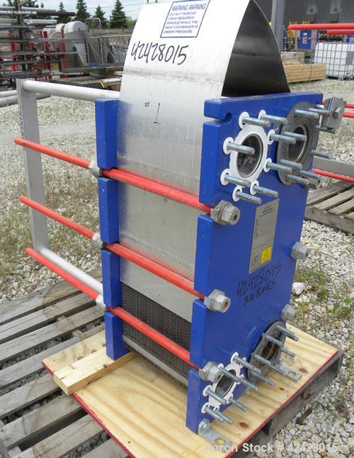 Used Alfa Laval Thermal Plate Exchanger, 296.98 square feet, model M10-BFG. (117) Approximately 14-1/2’’ wide x 34-1/2’’ tall x 0.50 mm thick 316 stainless steel plates. Designed 150 psi at –20 to 22...