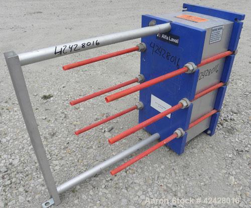 Used Alfa Laval Thermal Plate Exchanger, 296.98 square feet, model M10-BFG. (117) Approximately 14-1/2’’ wide x 34-1/2’’ tall x 0.50 mm thick 316 stainless steel plates. Designed 150 psi at –20 to 22...